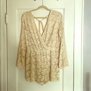 Ivory lace romper with tie back